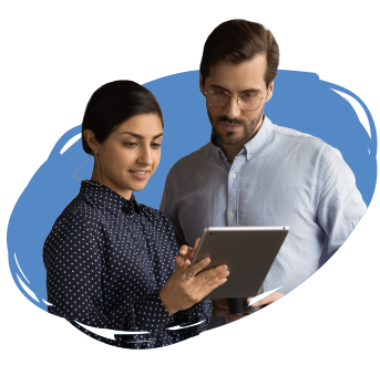 Two people looking down to a tablet they are holding